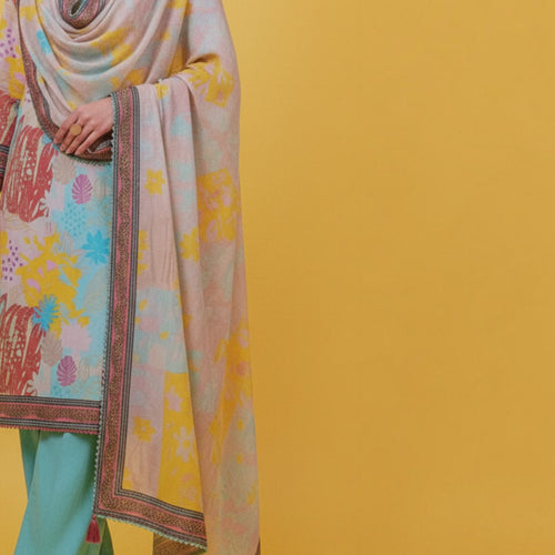 AllurifyYou three-piece ethnic suit set featuring a pastel floral print tunic, matching dupatta, and teal trousers.