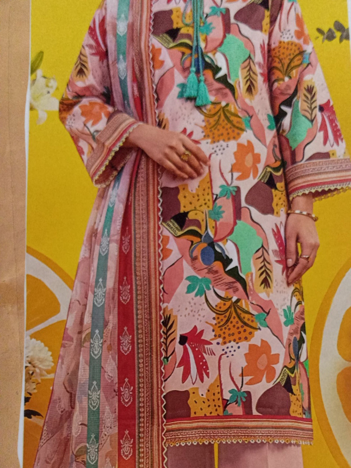 AllurifyYou floral printed lawn kurti featuring a multi-coloured abstract pattern and intricate sleeve detailing.