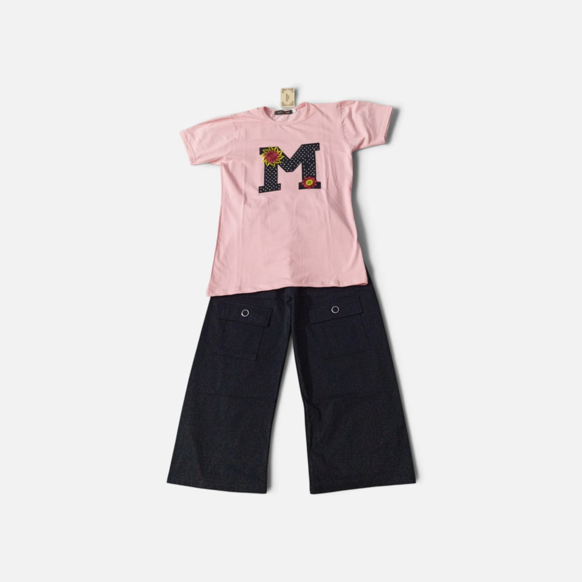 AllurifyYou girls pink graphic t-shirt with sunflower M appliqué and charcoal grey cargo trousers two-piece set
